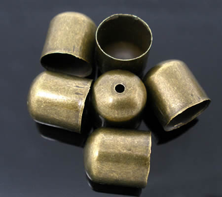 2x Eind kappen Brons