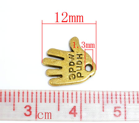 10 stuks "Hand made" Bedel Goudkleurig