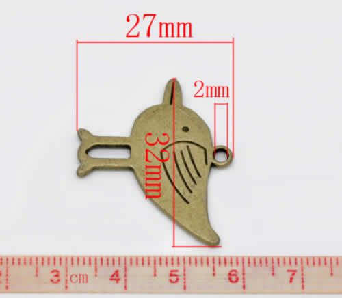 1x Bedeltje Brons Vogeltje 32 x 27 mm