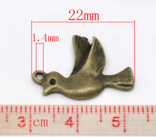 1x Bedeltje Brons Duifje