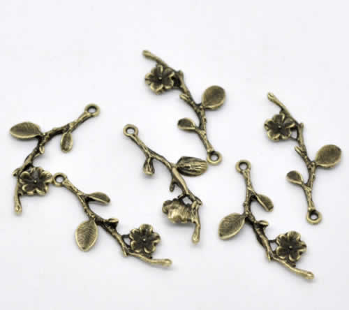 1x Bedeltje Brons Bloemtakje