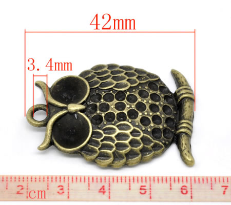 1x Bronzen Bedel Uil 42 x 29 mm