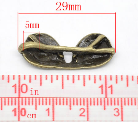 1x Bedeltje Zonnebrilletje