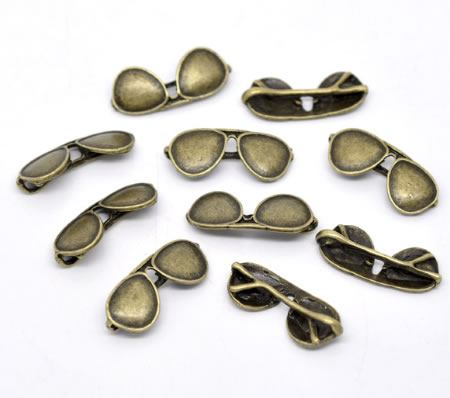 1x Bedeltje Zonnebrilletje