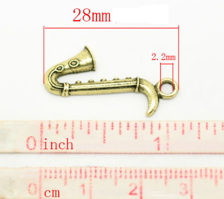 1x Saxofoon Bedeltje Brons