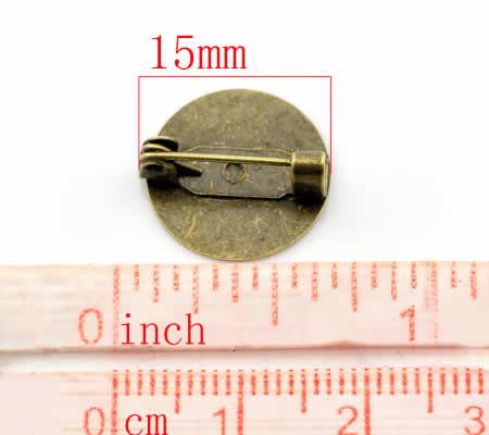 1x Broche plakspeldje Brons