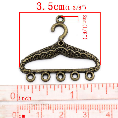 1x Bedel/ornament Kleding Hanger