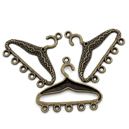 1x Bedel/ornament Kleding Hanger