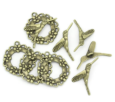 1x slotje Brons Vogeltje