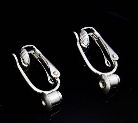 1 paar licht zilver oorbel klemmetjes / Stoppertje