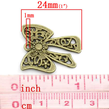 1x Bedel Strikje Brons 24 x 19 mm