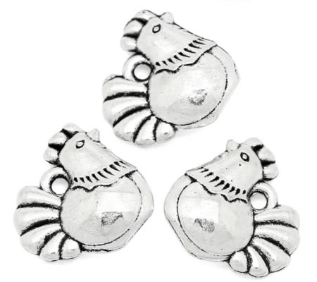 1x Bedeltje Kip Licht Zilver