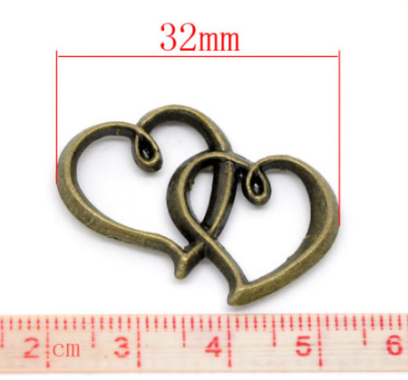 1x Bedel / Hanger Hartjes Brons