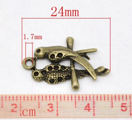 1x Bedeltje Brons Vogeltje 24 x 16 mm