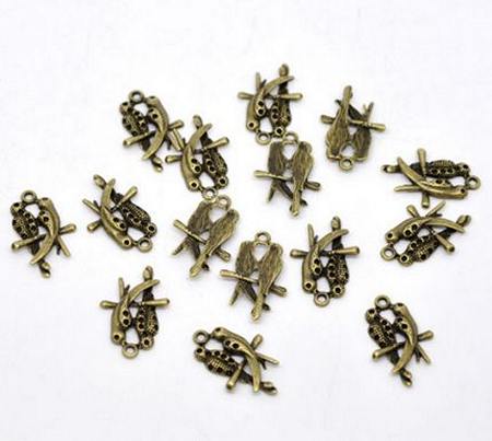 1x Bedeltje Brons Vogeltje 24 x 16 mm