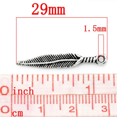 1x Bedeltje veertje / Oud Goud