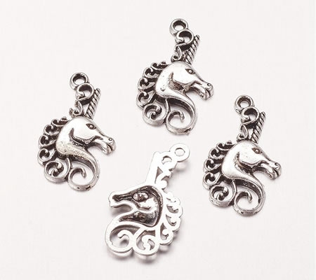 1x Eenhoorn antiek zilverkleurig